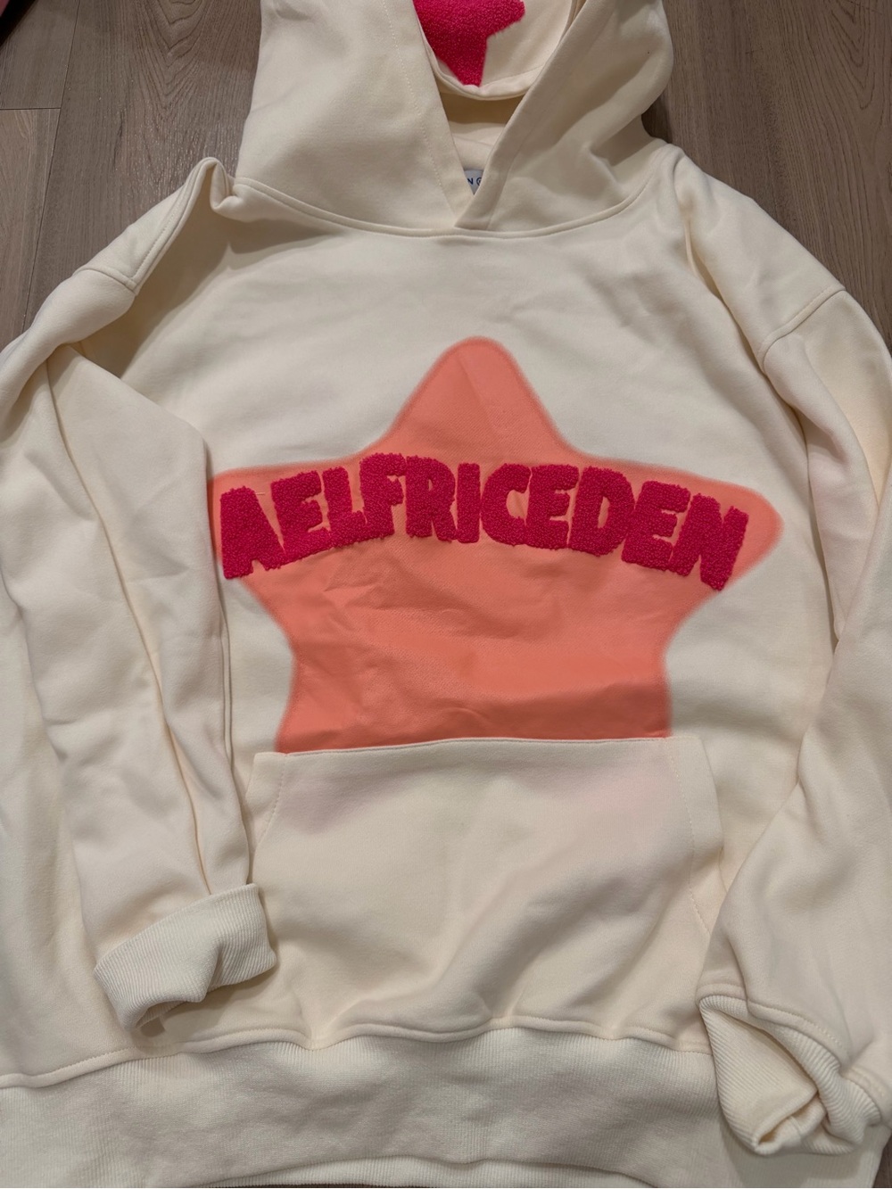 Aelfric Eden Cream Hoodie with Pink Logo and Coral Star